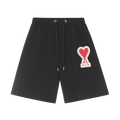 shorts AMI Paris en color negro con detalle de corazón rojo, estilo relajado y moderno.